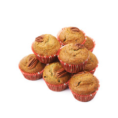 Pile of pecan nut cupcakes isolated