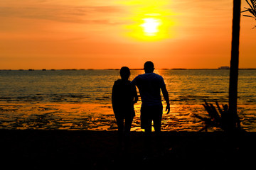 silhouette of a couple in love at sunset