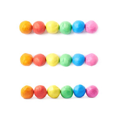 Lined up plasticine balls isolated