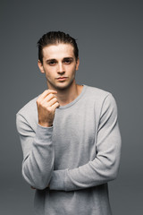 profile of nice handsome man on gray background