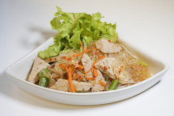 vermicelli and preserved pork sausage spicy salad on white background. Food Thailand. Yam noodles pork sausage