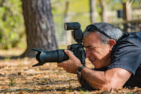 Male Photographer Shooting Camera Outdoors
