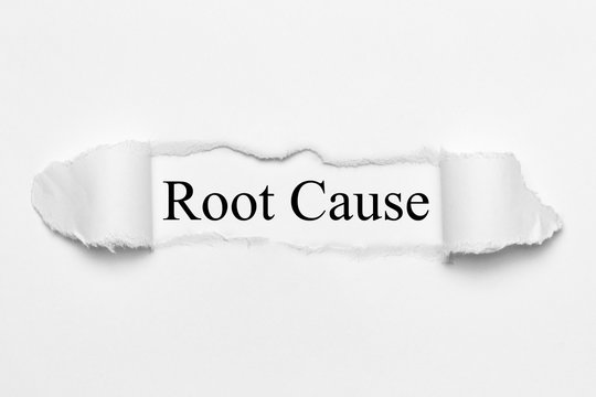 Root Cause on white torn paper