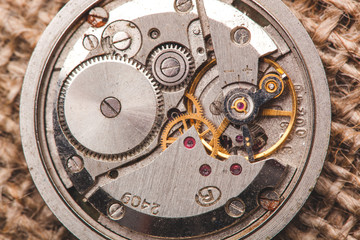 Fototapeta na wymiar Clockwork old mechanical USSR watch. close up, macro shot.