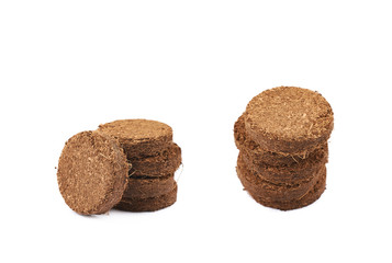 Compressed compost tablet isolated