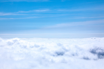 Clouds and blue sky seen from plane
