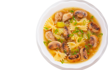 mushroom soup with pasta and vegetables. top view. isolated on white