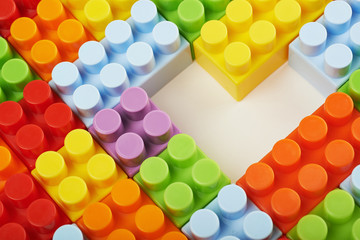 Surface covered with toy bricks