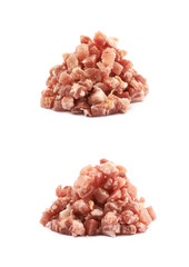 Pile of raw bacon bits isolated