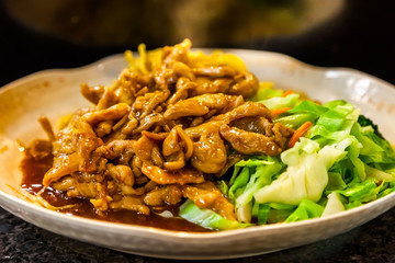 Plate of Asian chicken and noodles
