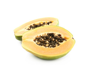 Papaya fruit cut in two halves isolated