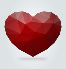 Red polygonal heart on white background. Vector Illustration. Symbol of love. Romantic background for Valentines day.