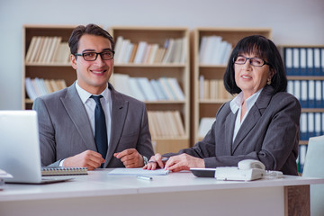 Businesspeople having business discussion in office