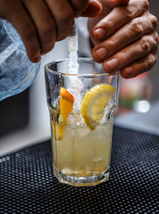Bartender is pouring soda water