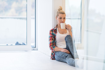 Portrait of a beautiful girl on the floor