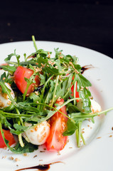 Fresh, summer salad with arugula leaves