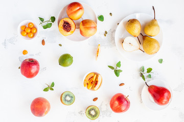 Fresh fruits on white background. Summer fruits. Flat lay, top view