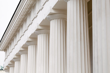 close-up columns of white stone of greek temple