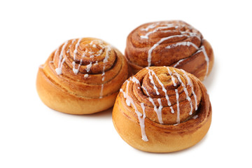 Fototapeta premium Cinnamon buns isolated on white background