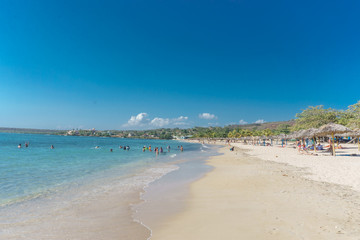 Fototapeta na wymiar Cuba - Caribbean beach Playa Rancho Luna in Cienfuegos. Sandy coast