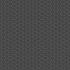 Dots in triangular shapes black and white seamless texture.