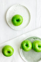 summer food with green apples on white background top view mock up
