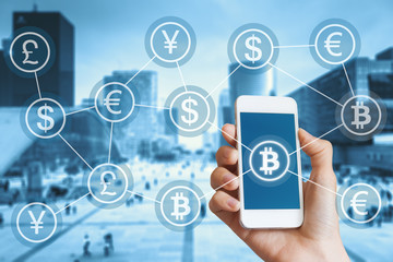 Bitcoin cryptocurrency and blockchain concept for digital payment, city, person