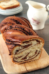 Sweet marbled brioche plait with nuts and chocolate