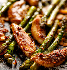 Grilled chicken breast, green asparagus and capers