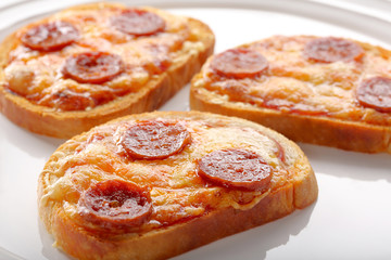 Fresh toast with cheese and chorizo sausage