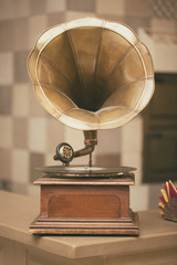 Retro old gramophone radio. Vintage style toned photo