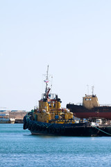 Fototapeta premium tugboat in the port of sea