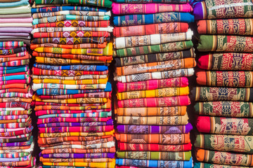 Piles of traditional textile products in Humahuaca village, Argentina