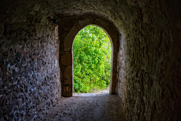 Tunnel through the castle wall into the garden