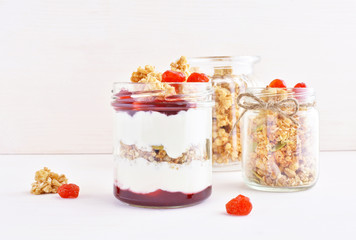 Fototapeta na wymiar Greek yogurt with dry cherry berries