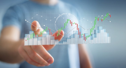 Businessman using digital 3D rendered stock exchange stats and charts