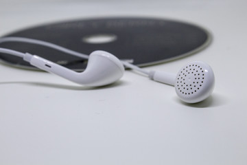 Listen the music by Headphone on white background