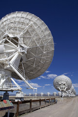 Radio telescope dish pointed up at the sky