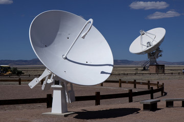 Radio telescope dish pointed up at the sky