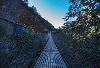 Suspension bridge in the mountains