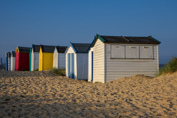 Fototapeta na wymiar Colourful beach huts at Southwold