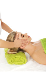 Obraz na płótnie Canvas Young woman has face massage.