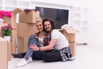 young couple moving  in new house