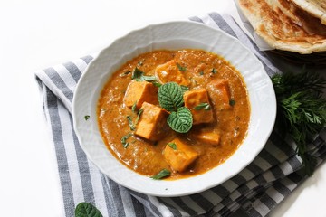 Paneer Butter Masala / Indian Vegetarian Cottage Cheese curry, selective focus