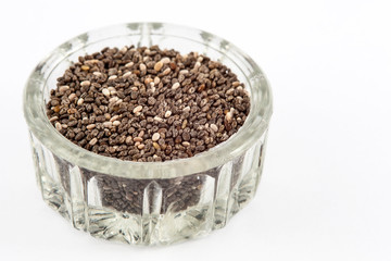 Chia seeds (Salvia hispanica) isolated in white background