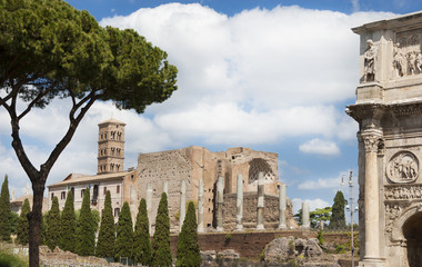 Fototapeta na wymiar Ancient Temple of Venus and Roma with Arch of Constantine in Rome