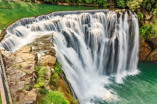 Fototapeta Beautiful Waterfall in Shifen Waterfall, Shifen waterfall is located at Pingxi township in Taipei, Taiwan, Long Exposure