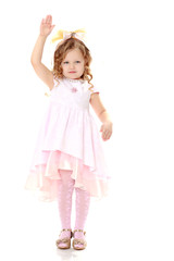 Girl shows the doll.