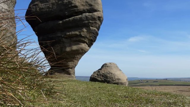 Great Bridestones in North Yorkshire near Todmorden, England, UK. Natural sculpture of the Bride and fallen Groom to her right.
