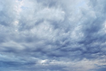 Naklejka na ściany i meble Gray cloud formations on sky,Nimbus moving,Appearance of raincloud,Strange shape of dark clouds,Dramatic cloudscape area,Thailand 